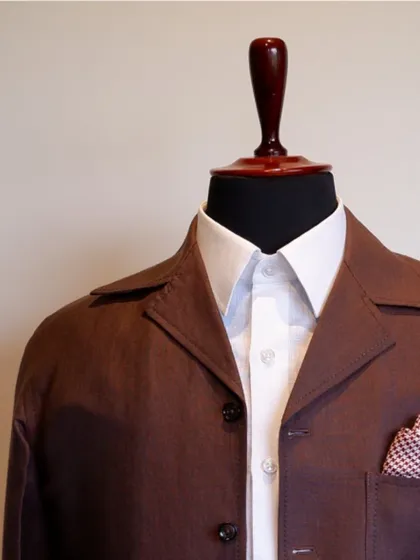 Elevate your style with our exquisite brown linen overshirt, a versatile piece for any season.