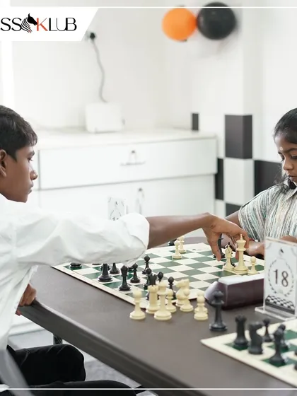 Two young players locked in a strategic battle. Our tournaments provide the perfect practice ground for students to apply the chess lessons and tactics they learn in class.