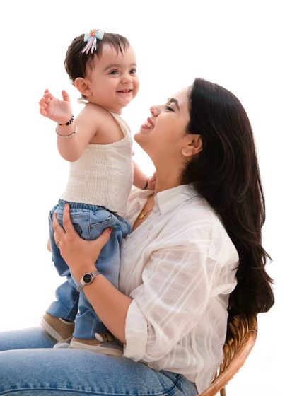 The look of love between a mother and child is truly magical. My goal is to capture that unspoken connection in a simple, beautiful frame.