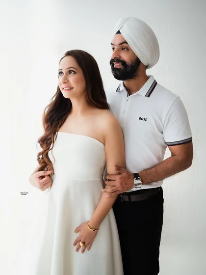 A beautiful and dreamy couple's portrait. The soft lighting and their gentle expressions create a romantic and timeless feel.
