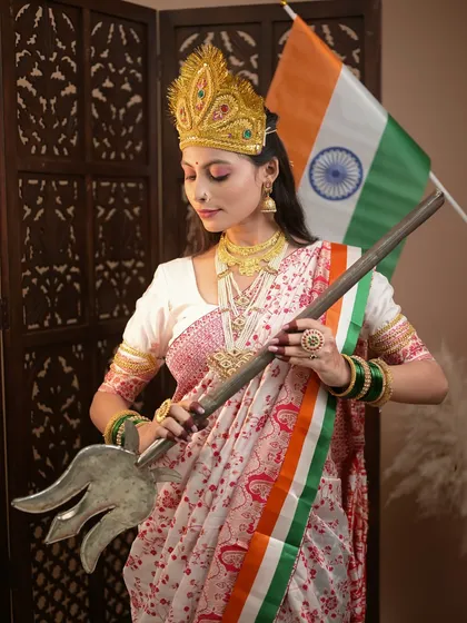 A contemplative pose, reflecting the deep respect and love for our nation.
