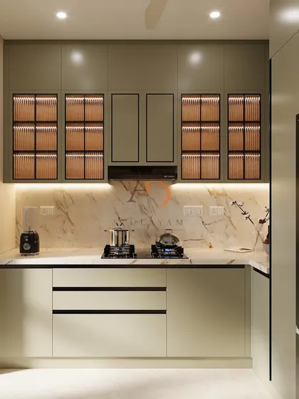 A kitchen is the heart of the home, and I design them to be both beautiful and highly functional. This modular kitchen features sleek, dual-tone cabinetry with fluted glass, under-cabinet lighting for ambiance, and a stunning marble backsplash, proving that practicality can be elegant.