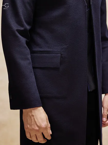 The details are where my craft truly shines. This close-up reveals the rich texture of tailored corduroy, a fabric I use to bring a fresh, sophisticated feel to classic menswear.