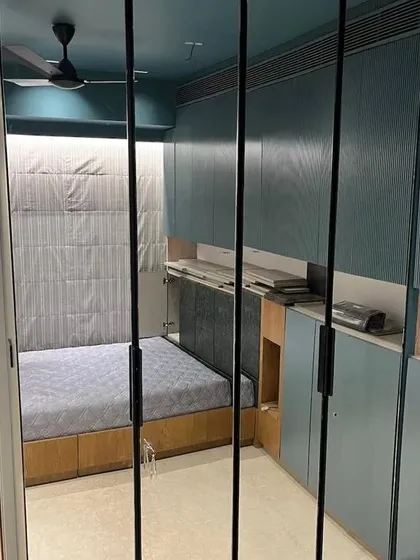 This is a custom wardrobe I built and installed for a client. It features fluted paneling and a seamless look that integrates with the bedroom's overall design. My wardrobes are made to order, so every inch of space is utilized effectively.