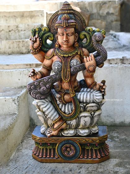 A recently sold 36-inch Goddess Saraswathi statue, finished in a beautiful antique color palette. The white lotus and colorful details make this a particularly striking piece.