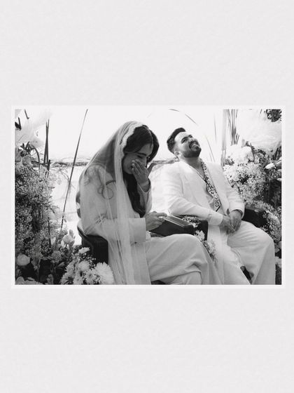 A black and white photo capturing a wave of emotion during the ceremony. These are the real, unscripted moments I look for. The ones that show the vulnerability and depth of feeling on a wedding day.