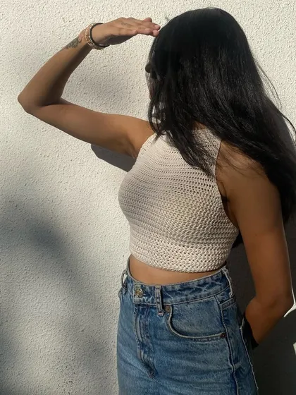 A side profile of the handmade halter neck top. The design is crafted to be comfortable and secure, making it perfect for all-day wear.