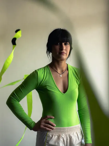 Playing with light and shadow in the studio to create a more artistic and moody portrait for the fitness campaign.