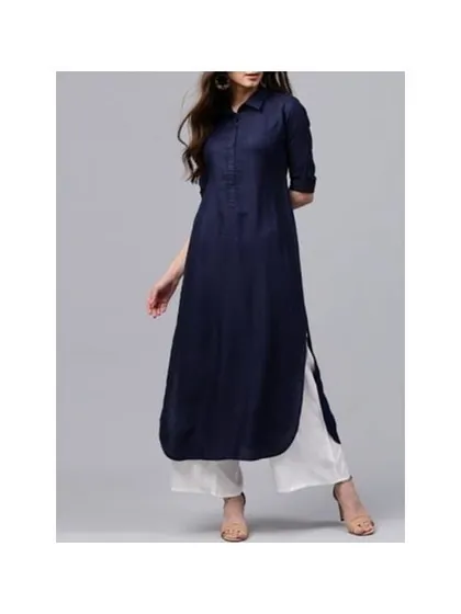 A well-stitched shirt-collar kurti is a wardrobe essential. This navy blue piece is tailored for a clean, professional look, paired with comfortable white palazzo pants. I focus on creating sharp lines and a perfect fit for your everyday and office wear.