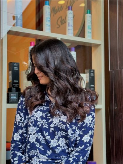 As delicious as it sounds. These Nutella chocolate waves feature deep, rich brown tones that are glossy, healthy, and styled to perfection.