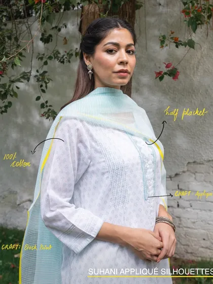 A closer look at the details of our Suhani appliqué silhouettes. This kurta features a half placket, 100% cotton fabric, and a blend of block printing and appliqué craft, all made in Rajasthan.