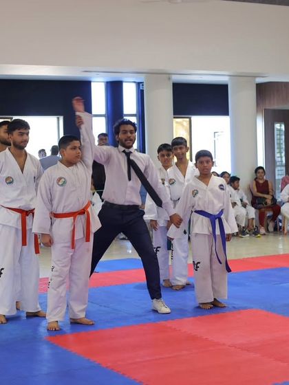 Our young athletes taking the oath at a national championship, demonstrating their commitment to the tenets of Taekwon-Do before the competition begins.