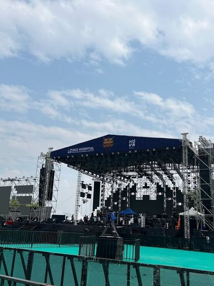 A wide-angle view of the main stage for Harris Jayraj, demonstrating the impressive width and height of the structure required for a show of this magnitude.