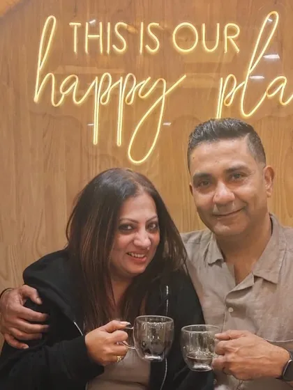 A couple takes a moment to relax with a warm beverage after their treatments. My goal is to create a space where you can comfortably reconnect.