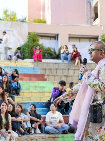 Fashion guru Prasad Bidapa addressing an engaged audience at our festival, sharing his insights on handmade textiles and fashion.