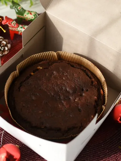My Christmas Plum Cake, packed in a simple box, ready to be shared with loved ones during the holidays.