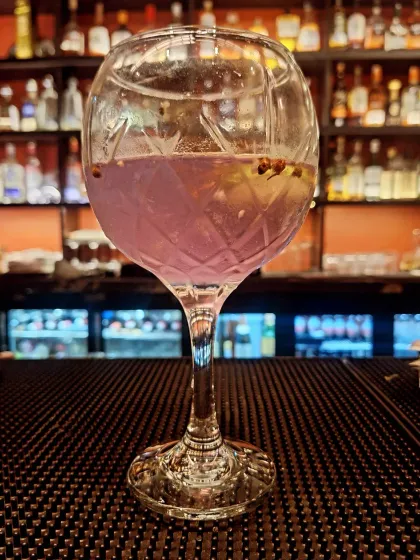 A beautiful gin-based cocktail from Royal China, with a lovely purple hue.