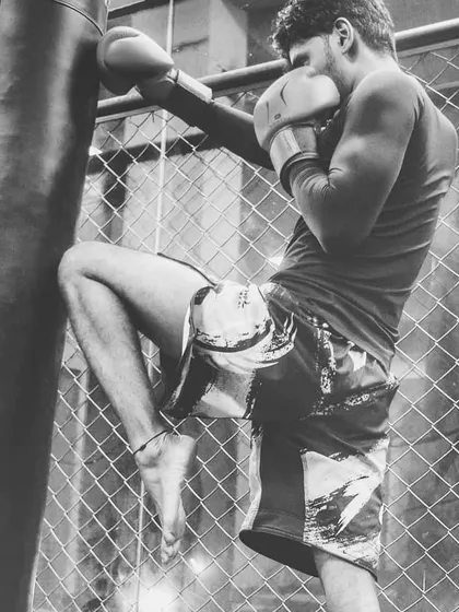 A powerful knee strike on the heavy bag. This kind of kickboxing drill is essential for developing power in your strikes. We spend a lot of time on bag work to build stamina and perfect our technique.