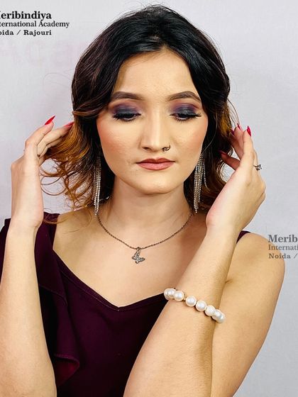 This look shows a softer approach to party makeup, with beautifully blended eyeshadow and a natural lip color.