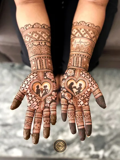 Your love story can be the centerpiece of your henna. This engagement mehendi features a silhouette of the couple inside a heart, surrounded by delicate roses and a heartbeat motif on the wrist.