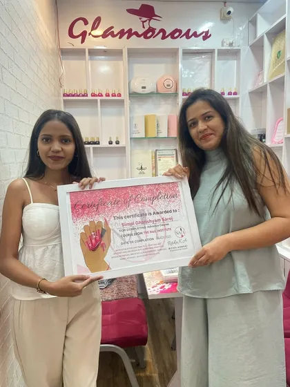 I am happy to present a certificate of completion to Gingi, who has mastered advanced techniques in our professional course.