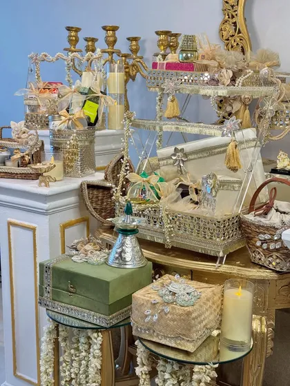 Another view of the festive collection, showcasing the variety of gift boxes, baskets, and decorative items that can be curated for a grand festive display.