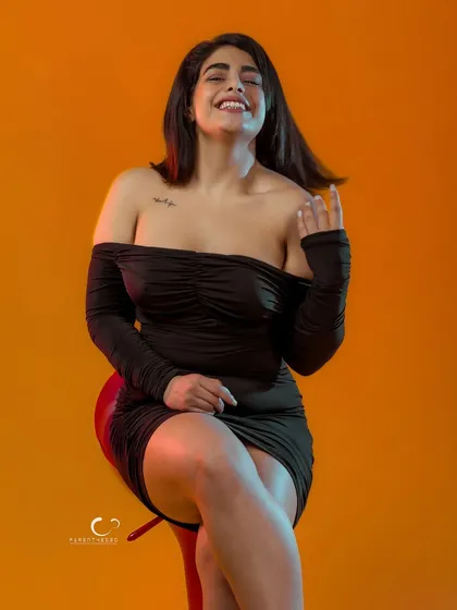 A moment of pure joy and laughter. This shot proves that even in a high-fashion setup, authentic emotion is the most beautiful thing to capture.