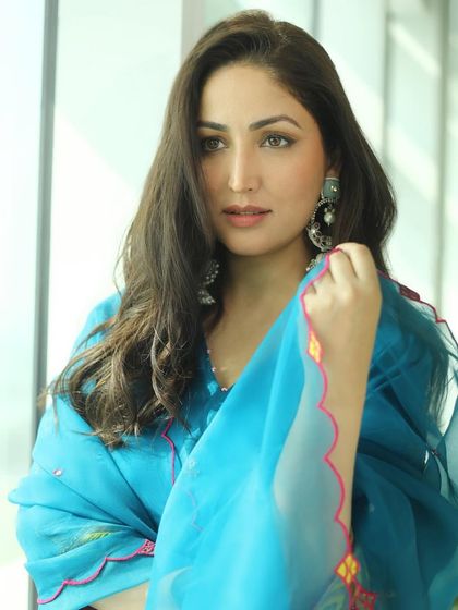 A traditional look for Yami Gautam during 'Dhoomdham' promotions. I created a fresh and radiant makeup look with a soft pink lip to complement her beautiful blue suit.