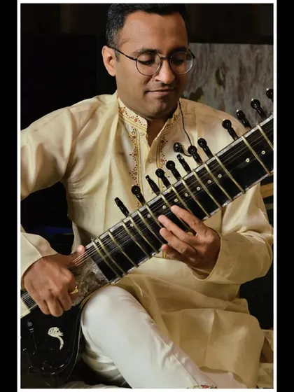 A gentle smile during a summer evening concert.
