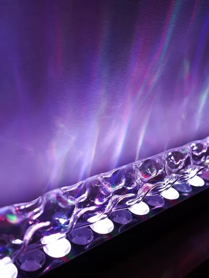 A close-up of our color-changing LED bar, which creates beautiful, flowing light effects. The textured lens helps to diffuse and mix the colors, producing a mesmerizing display on any surface.