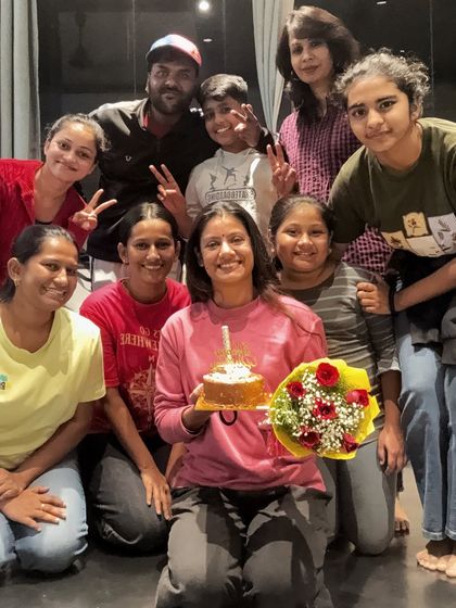 Surrounded by my students for a birthday celebration. It's a joy to be a teacher and a mentor to such a wonderful group of people.