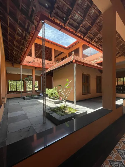 At the heart of the 'SHANTHA-KAMALA' residence is this open-to-sky courtyard, a core element of traditional Karnataka architecture that brings light, air, and nature into the home.