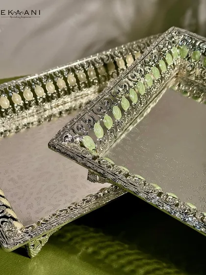 The same elegant serving tray, shown here with a soft green enamel. These pieces are perfect for special occasions or for bringing a touch of everyday luxury to your home.