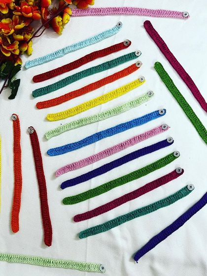 Getting ready for Friendship Day with a large batch of my handmade crochet friendship bands, available in a wide spectrum of colors.