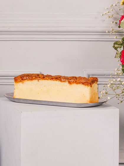 A simple yet elegant almond loaf cake, a comforting and delicious treat that we often include in our bespoke festive hampers.