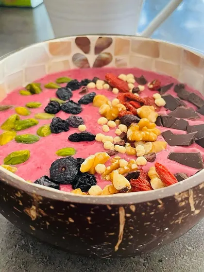 You can't out-train a bad diet. I believe eating well is a sign of self-respect, and I love starting my day with a nutrient-packed smoothie bowl with berries, nuts, and a little dark chocolate.