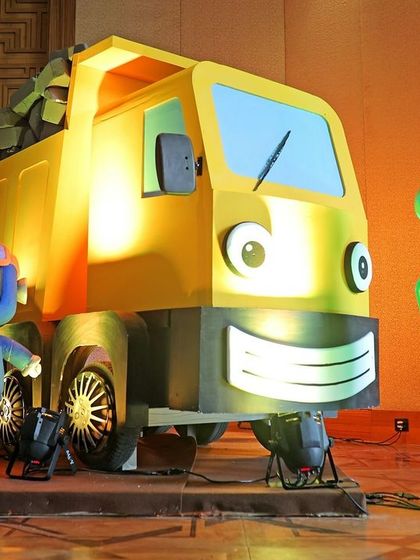 Welcome to Gecko's Garage. For this unique theme, I created life-sized character models of Gecko, the Mechanicals, and their truck, bringing the popular animated series to life.