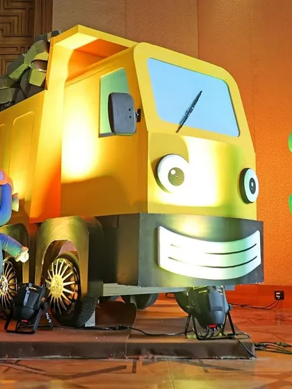 Welcome to Gecko's Garage. For this unique theme, I created life-sized character models of Gecko, the Mechanicals, and their truck, bringing the popular animated series to life.