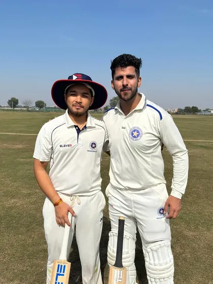 Two players from our affiliated clubs, Delhi Blues and Neo Sports, pose for a photo. We encourage a spirit of healthy competition and mutual respect among all our trainees.