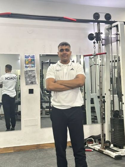 A confident pose in the gym.