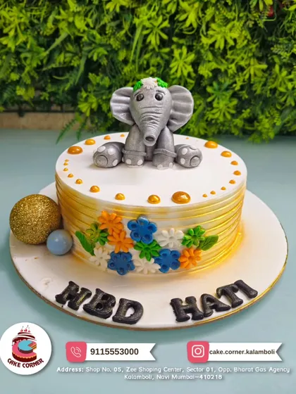 An adorable elephant cake for Hati's birthday. The cute fondant elephant and colourful flowers make this a sweet and charming design.