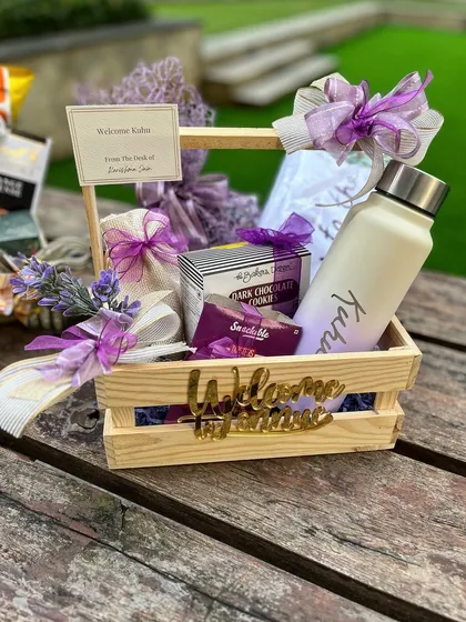 A fully custom employee welcome basket for the brand Lonnue. Featuring a personalized water bottle and other curated goodies in the brand's signature purple, it’s a perfect blend of corporate welcome and luxury appreciation.