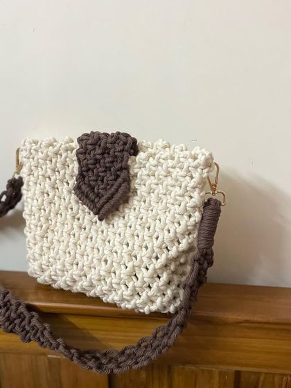 Another angle of my off-white and brown macrame sling bag. It's a great everyday bag that adds a bit of handmade charm to your look.