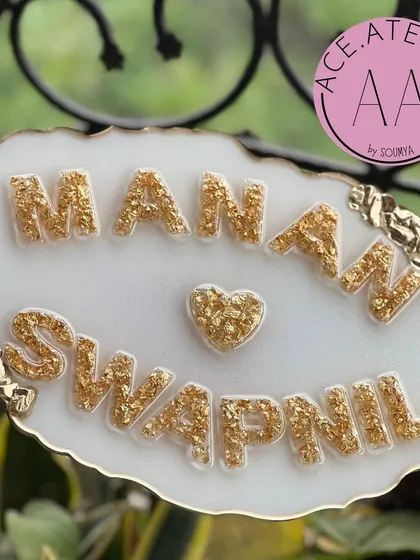 Another look at the classic white and gold geode style, this custom nameplate for Manan and Swapnil is a perfect housewarming gift.