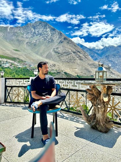 Taking a moment to breathe and soak in the view. The mountains teach us the importance of pausing and appreciating the stillness.