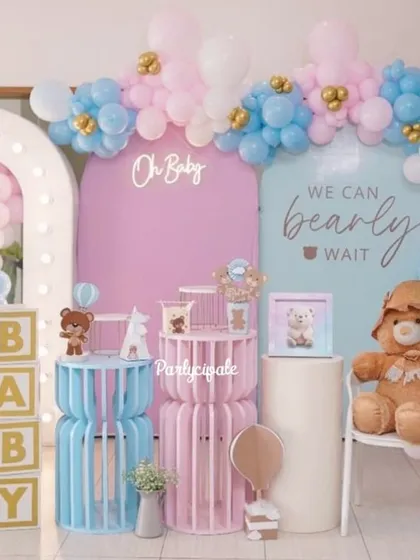 A baby shower is such a special milestone. For this 'We Can Bearly Wait' theme, we used a soft color palette of pink, blue, and gold, with a custom backdrop, balloon garlands, and adorable teddy bear details to celebrate the parents-to-be.