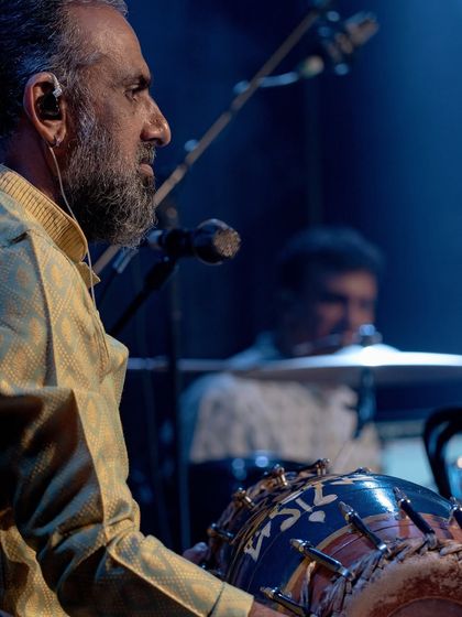 Pramath Kiran, focused and intense during our concert in Delhi. He brings a powerful and dynamic energy to the stage with his wide array of percussion instruments.