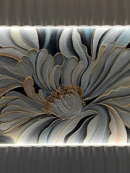 This simple but elegant flower painting was designed to enhance this space with coordinated colors. The backlighting makes it glow.