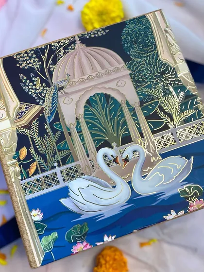 The stunning packaging for my premium Diwali 2024 collection. The swan motif box adds a touch of luxury to your festive gifting.