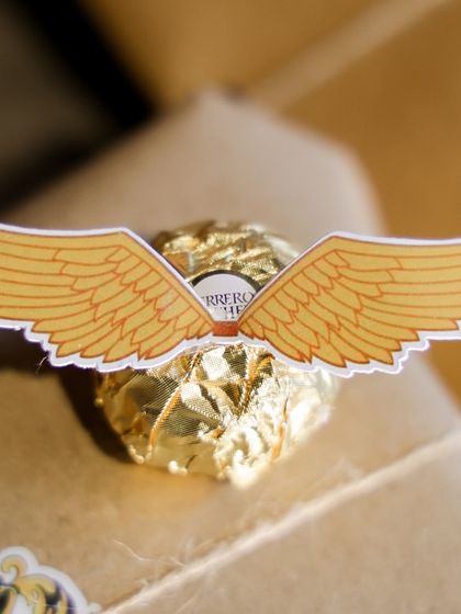 A magical detail from my Harry Potter hampers. Each Ferrero Rocher chocolate is transformed into a Golden Snitch with custom-made wings.